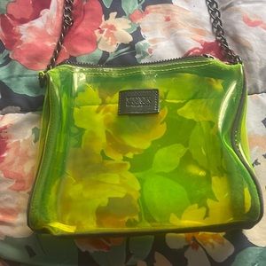 im selling a crossbody neon bag from pink